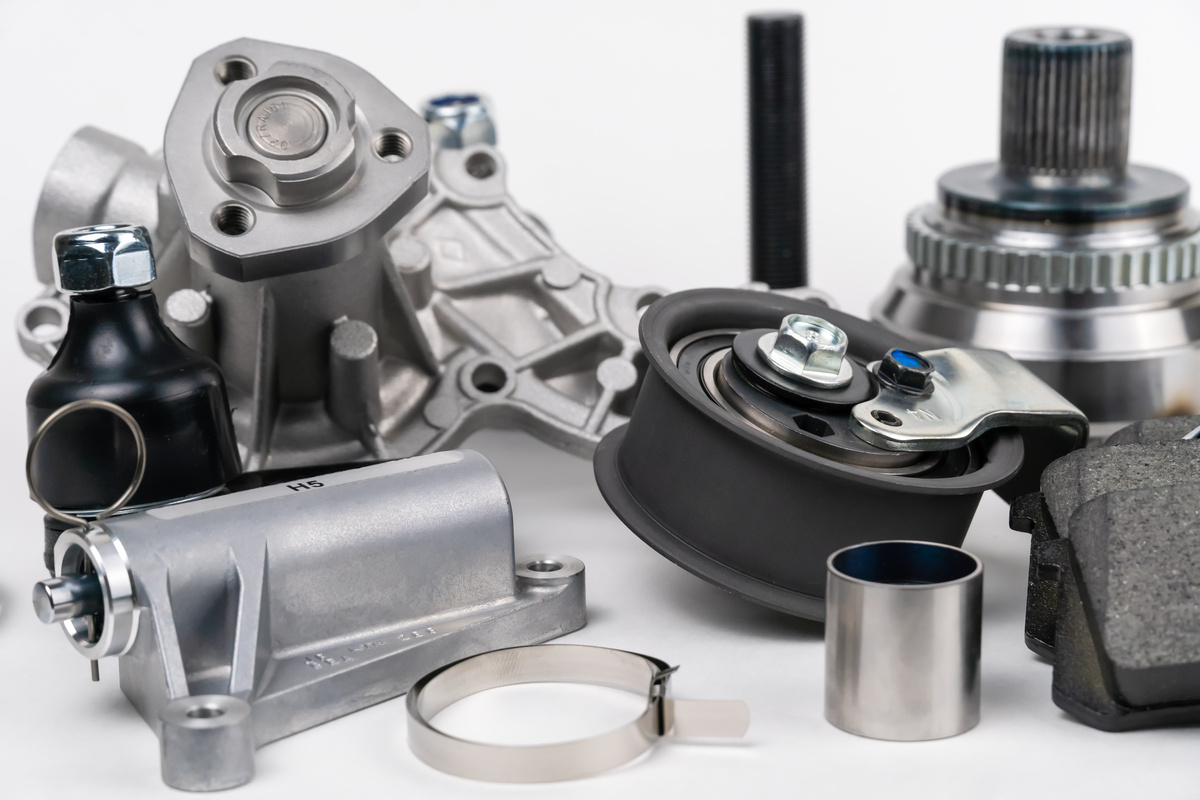 Auto parts spare parts car on white background. Auto parts store. Suspension and engine parts.
